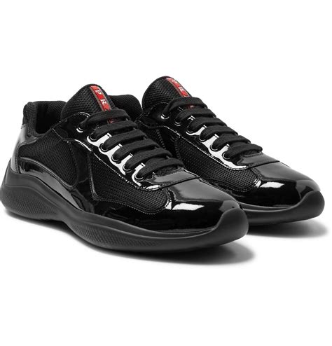 black patent leather Prada sneakers